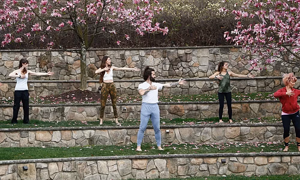 Group Qi Gong Meditation in the ampitheater at Grand Cascades Lodge at Crystal Springs Resort