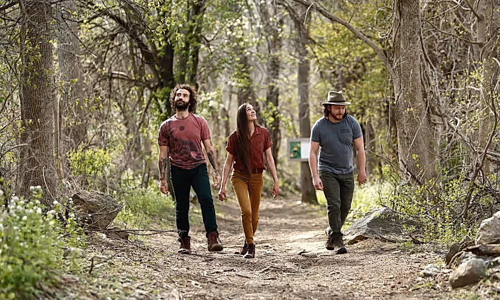 Three people hiking at Wild Turkey Nature Trail