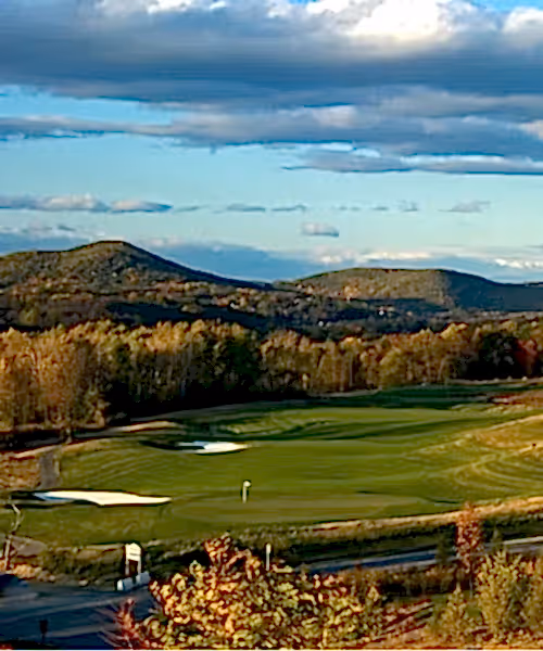 A view at sunset looking over the fairway of Cascades Golf Club at Crystal Springs Resort